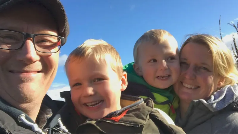 Ben and Nicky Relf in a family photo with two young boys, shown in ITV News Meridian's report.